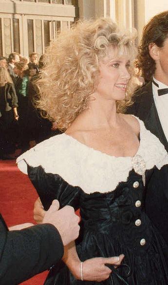 Olivia Newton-John durante una aparición pública en 1989